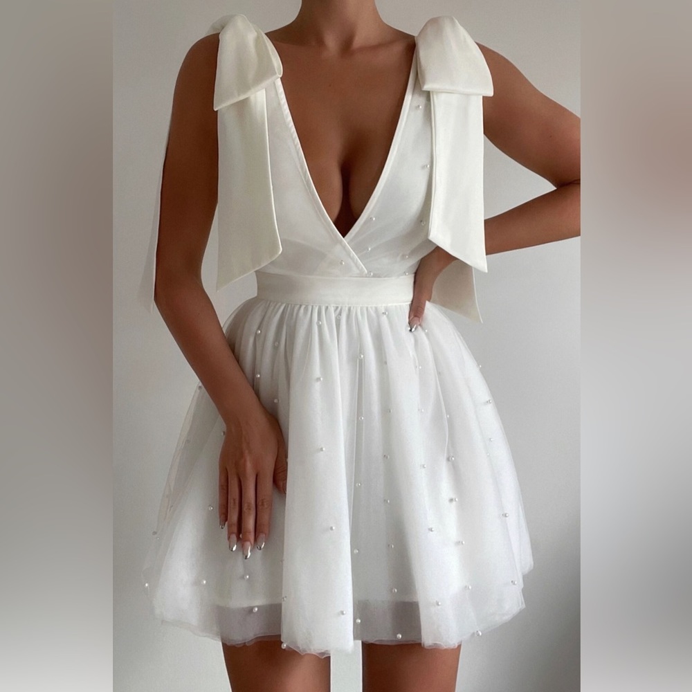 Karalyn mini dress- bow strap plunge pearl detail